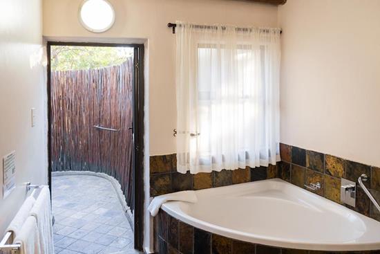Phalaborwa Safari Park, A Forever Resort: 4-Sleeper Chalet. 2 bedrooms (1 queen bed, 2 single beds)